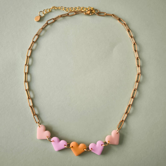Collar artesanal corazon en arcilla polimérica, hecho en España. Acero inoxidable. Livianos. Stock limitado. Naranja y rosa.