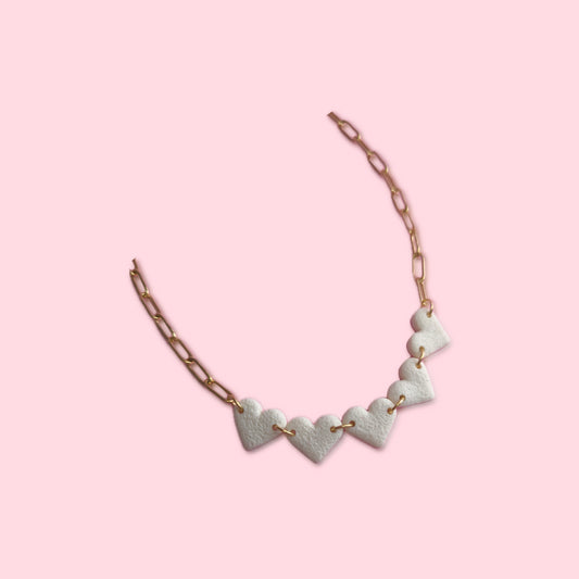 Collar mini corazón hueso
