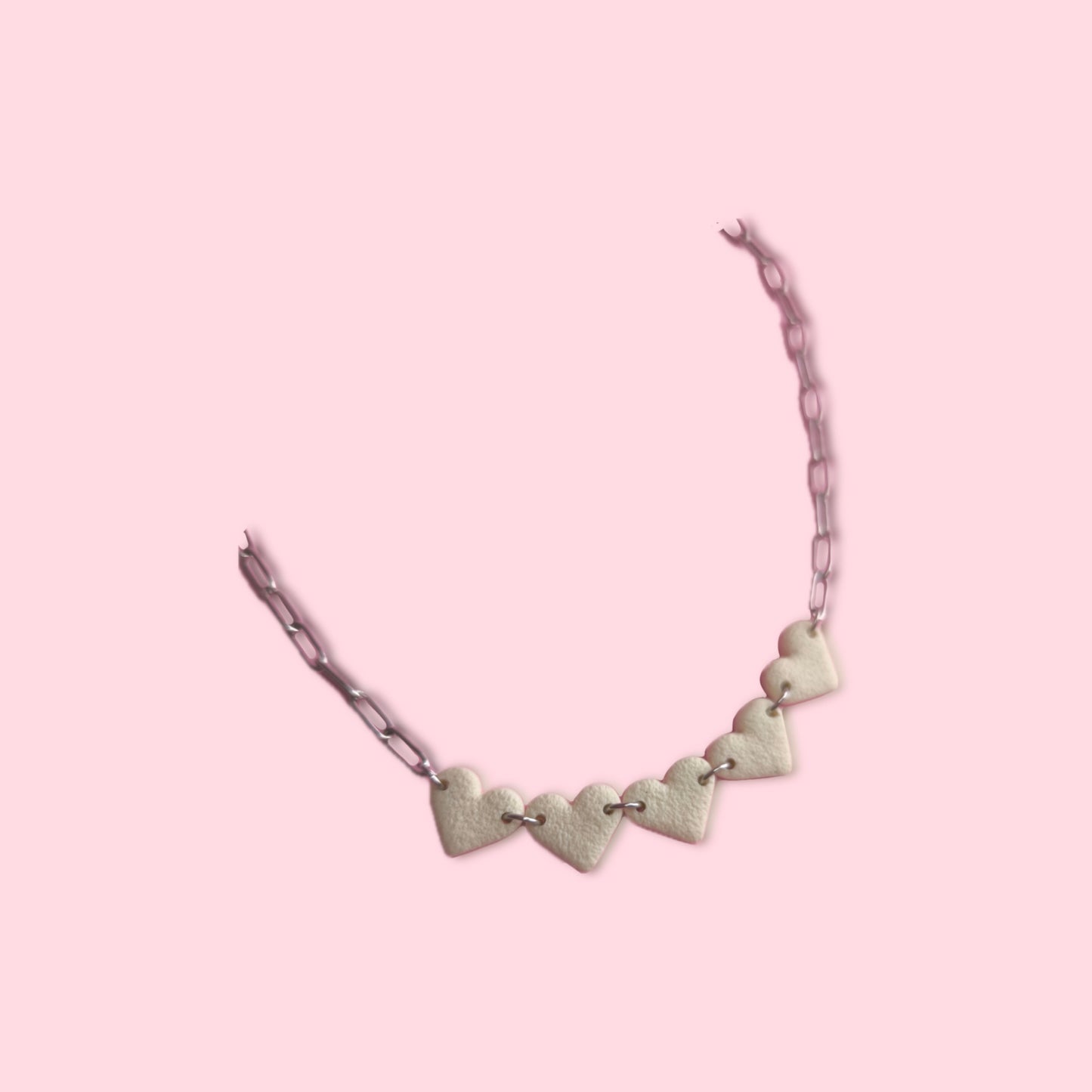 Collar mini corazón hueso