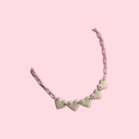 Collar mini corazón hueso