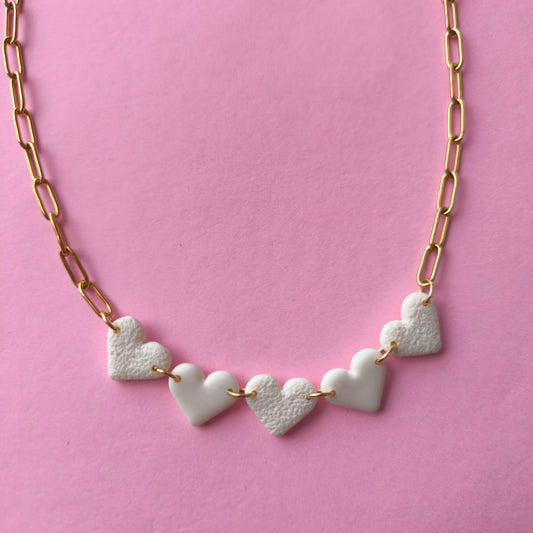 Collar mini corazón hueso