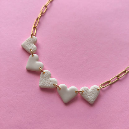 Collar mini corazón hueso