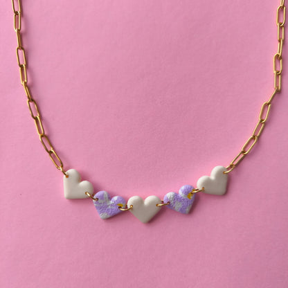Collar mini corazón a cuadros hueso y lila