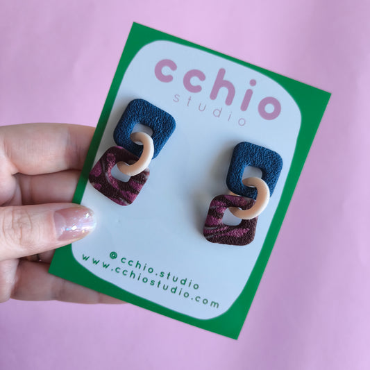 Pendiente artesanal hecho a mano con arcilla polimerica en España. Acero inoxidable