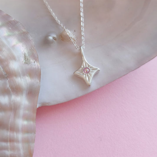 Colgante artesanal destello cristal Swarovski boreal fucsia en plata